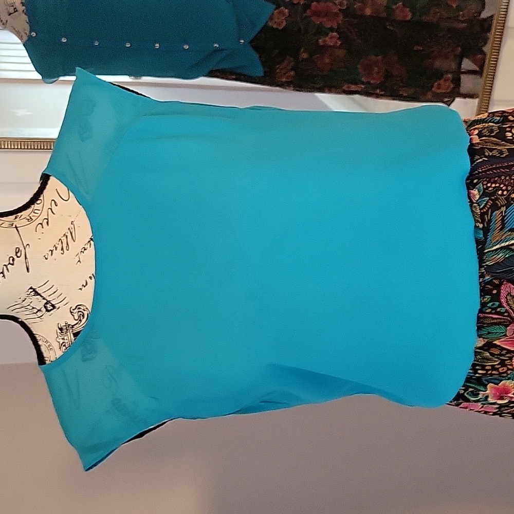 Turquoise sleeveless blouse